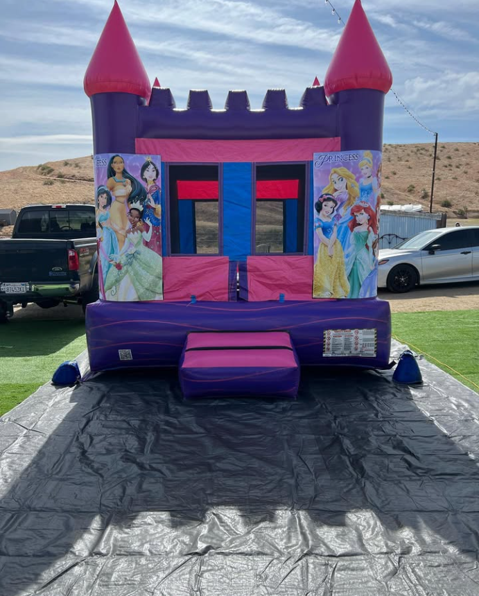 Pink and purple Minnie Mouse bounce house
