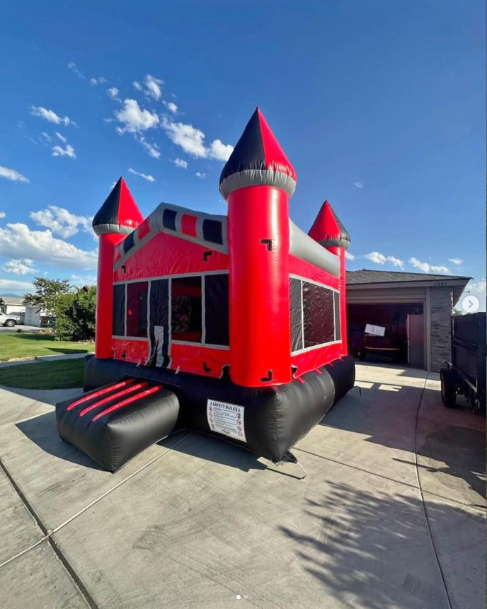 Red and black castle bounce house